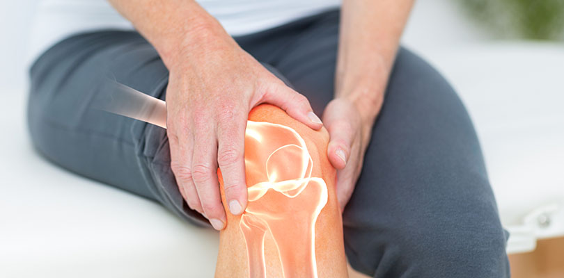 Man suffering from knee joint pain
